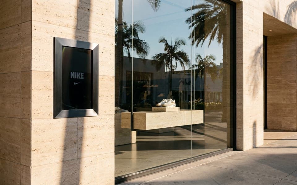 A Blicq digital screen beside a shopfront